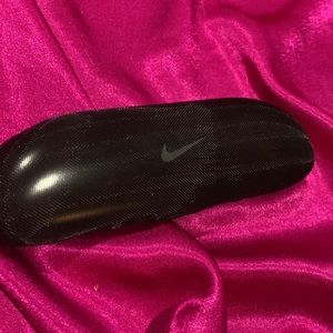 Nike heavy duty glasses case. Kevlar outside. Very hard closure